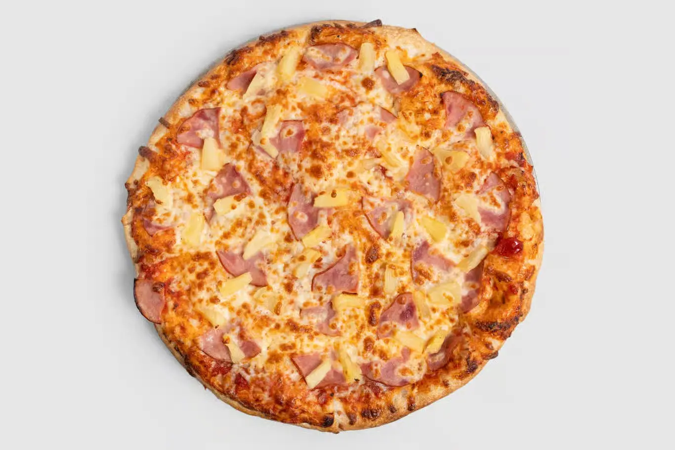 Hawaiian Lover Pizza at Sages Pizza & More Calgary - Classic ham and pineapple with extra cheese